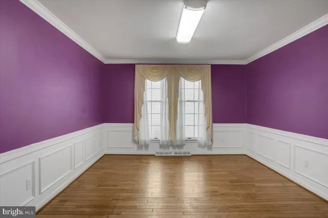 a kitchen with stainless steel appliances granite countertop a sink and a stove