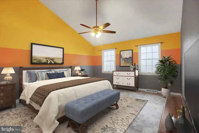 a view of an empty room with a ceiling fan