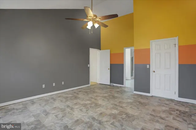 a bathroom with a tub and a shower