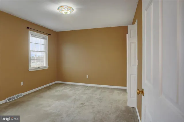 an empty room with an entryway