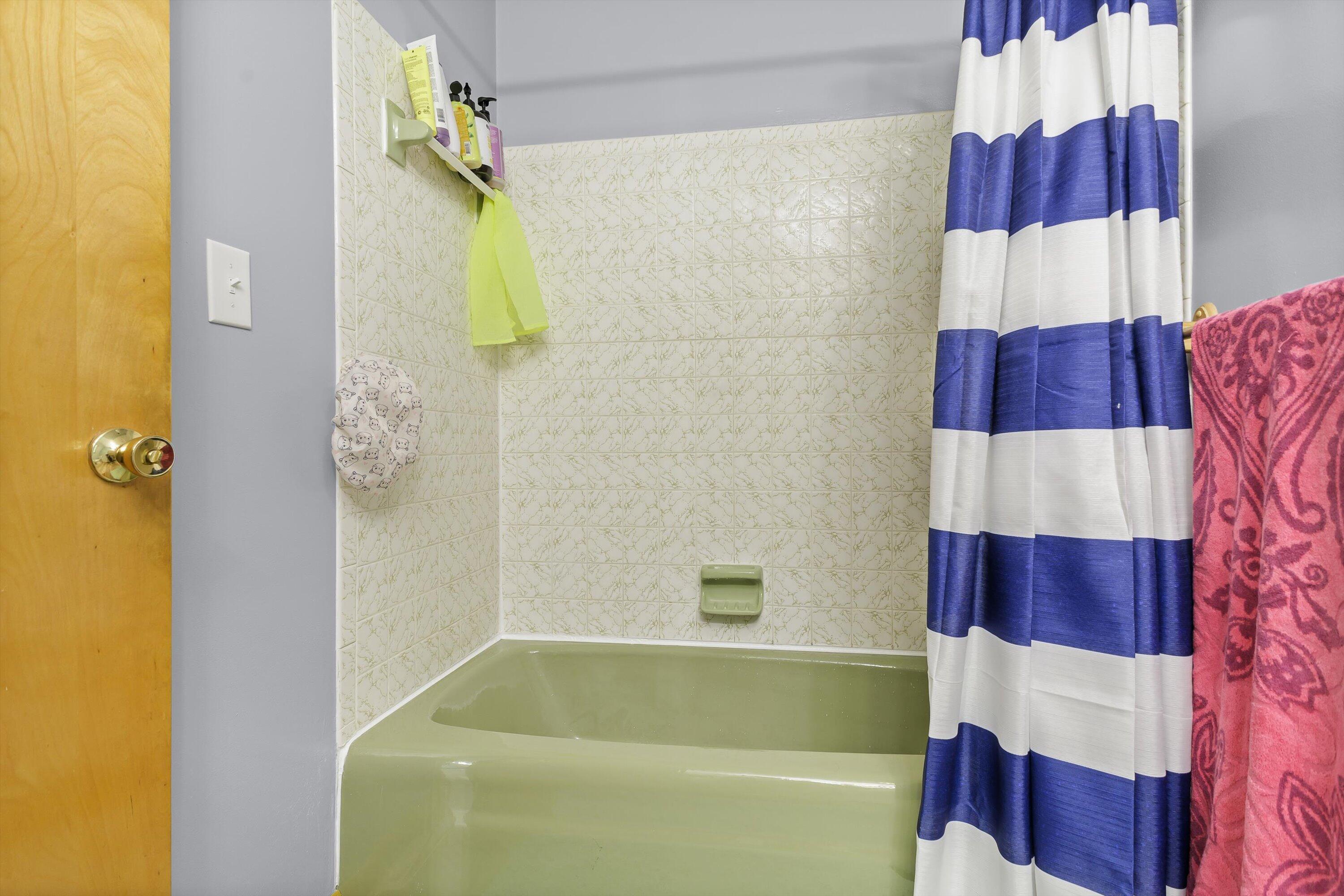 2560 Fishers View Road Shawsville, VA 24162 - Photo 15 of 30 a bathroom with a bathtub and shower