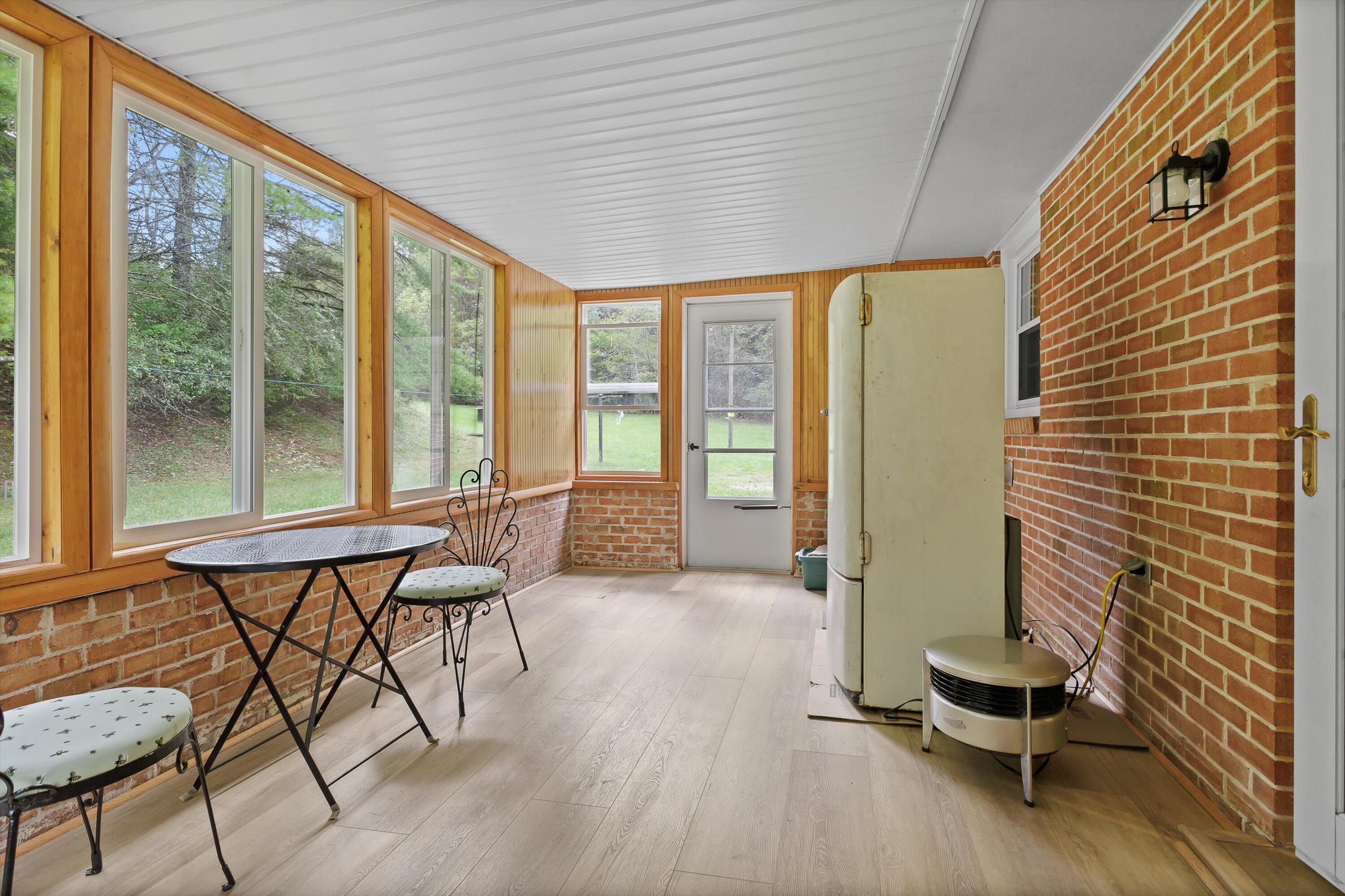 2560 Fishers View Road Shawsville, VA 24162 - Photo 23 of 30 a living room with furniture and a large window