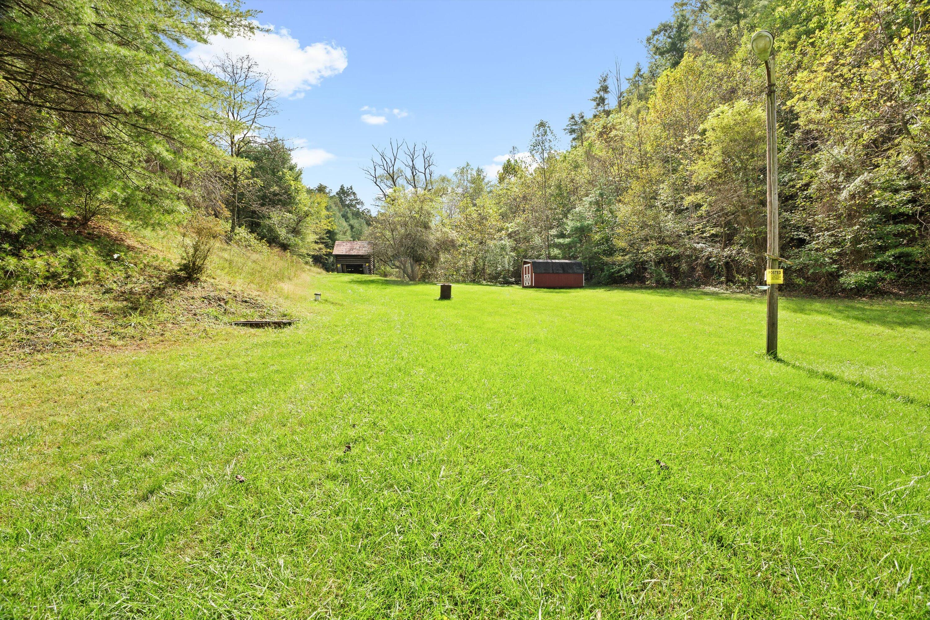 2560 Fishers View Road Shawsville, VA 24162 - Photo 28 of 30 a view of a field with a tree