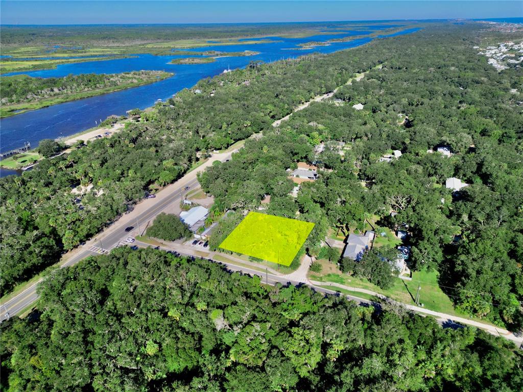 2 Seminole Avenue Palm Coast, FL 32137 - Photo 2 of 18 a view of a field with an ocean