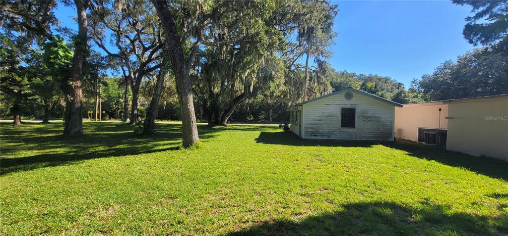2 Seminole Avenue Palm Coast, FL 32137 - Photo 10 of 18 a view of a house with a yard