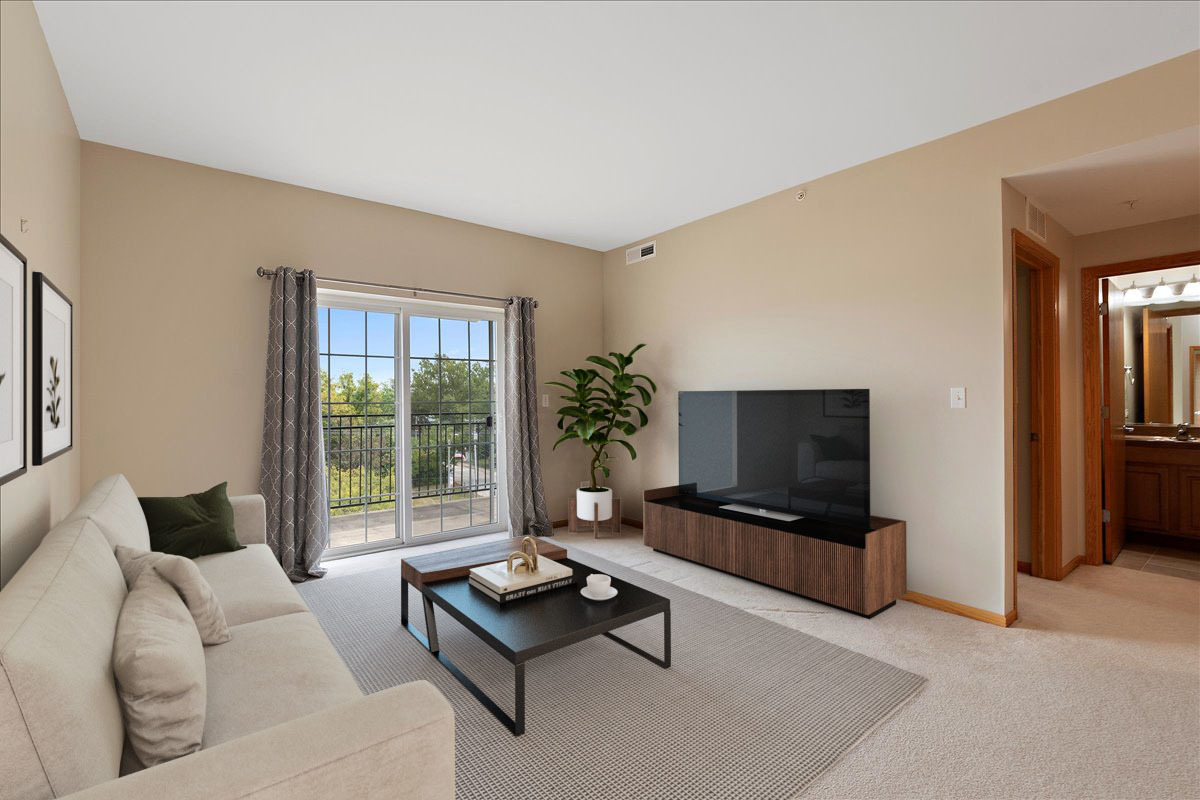 19806 Wolf Road, Unit 405 Mokena, IL 60448 - Photo 2 of 14 a living room with furniture and a flat screen tv