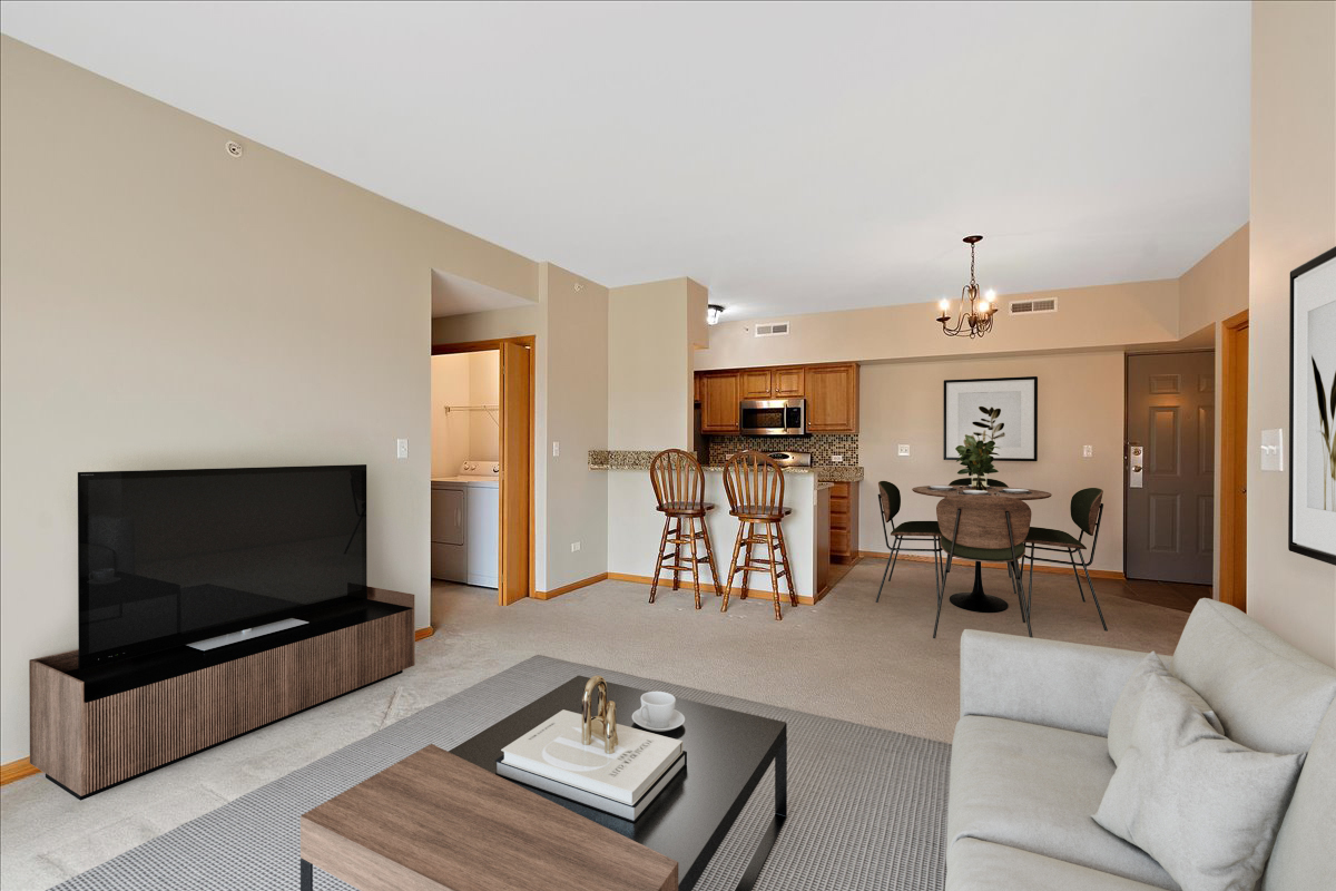 19806 Wolf Road, Unit 405 Mokena, IL 60448 - Photo 3 of 14 a living room with furniture and a flat screen tv