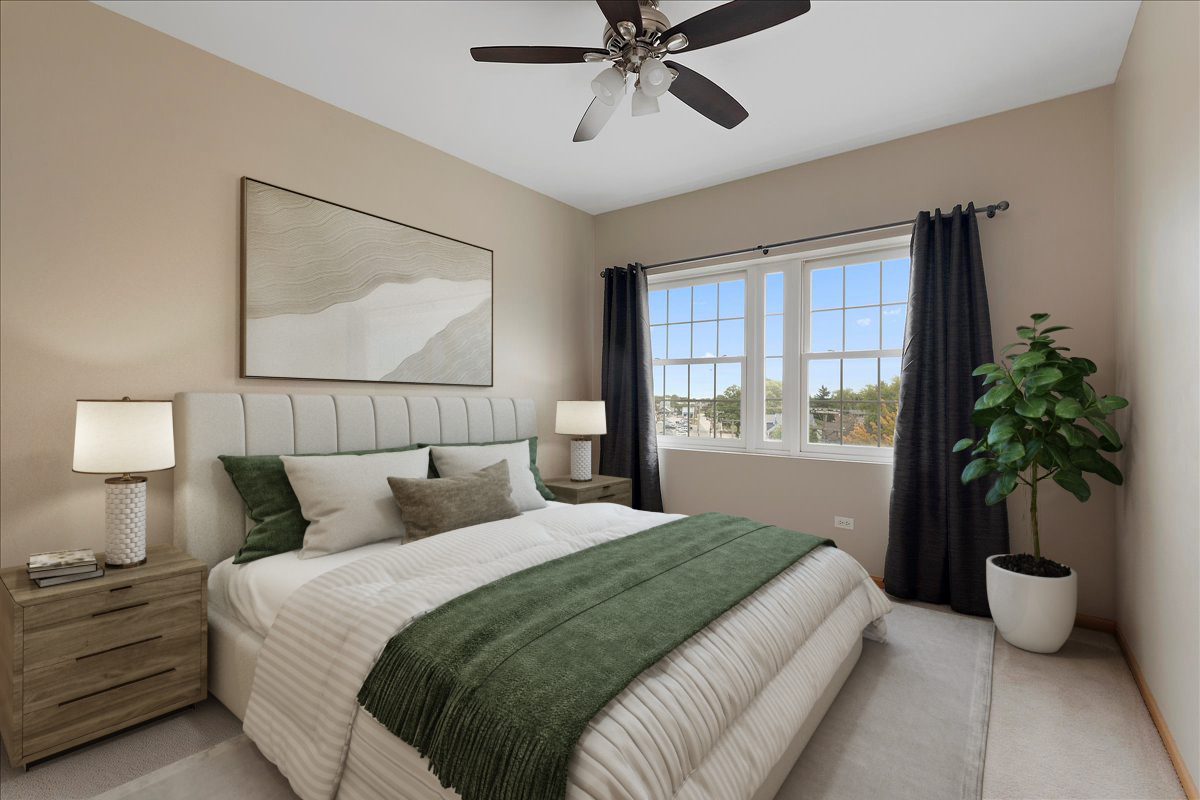 19806 Wolf Road, Unit 405 Mokena, IL 60448 - Photo 6 of 14 a bedroom with a large bed and a potted plant