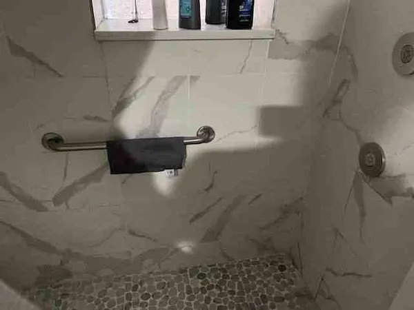a close view of a shower in a bathroom
