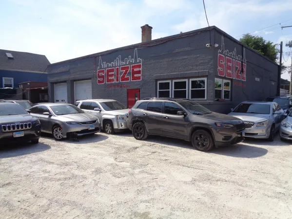 a view of a car parked in front of a house