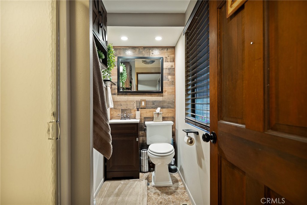 31353 Lightfoot Way Running Springs, CA 92382 - Photo 17 of 42 a bathroom with a sink toilet and shower