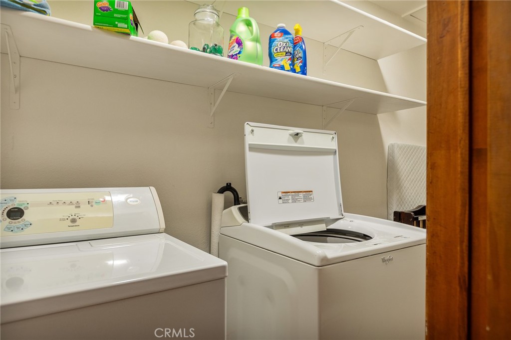 31353 Lightfoot Way Running Springs, CA 92382 - Photo 22 of 42 a utility room with dryer and washer