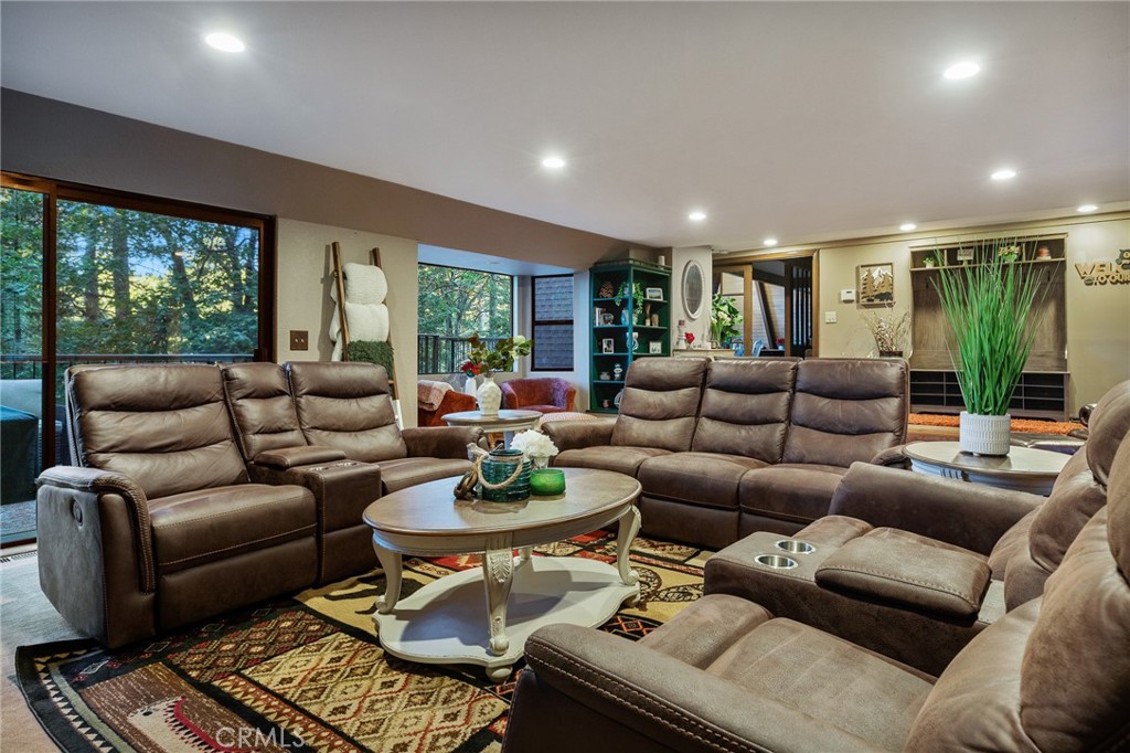 31353 Lightfoot Way Running Springs, CA 92382 - Photo 4 of 42 a living room with furniture and a large window