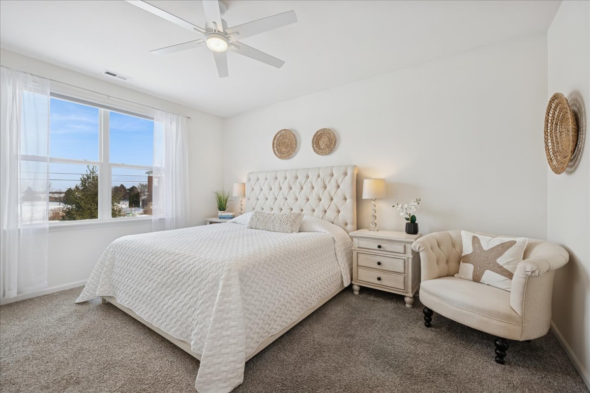 1639 Rochester Road Pingree Grove, IL 60140 - Photo 15 of 21 a bedroom with a bed and a couch