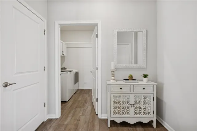 a room that has a dresser in it