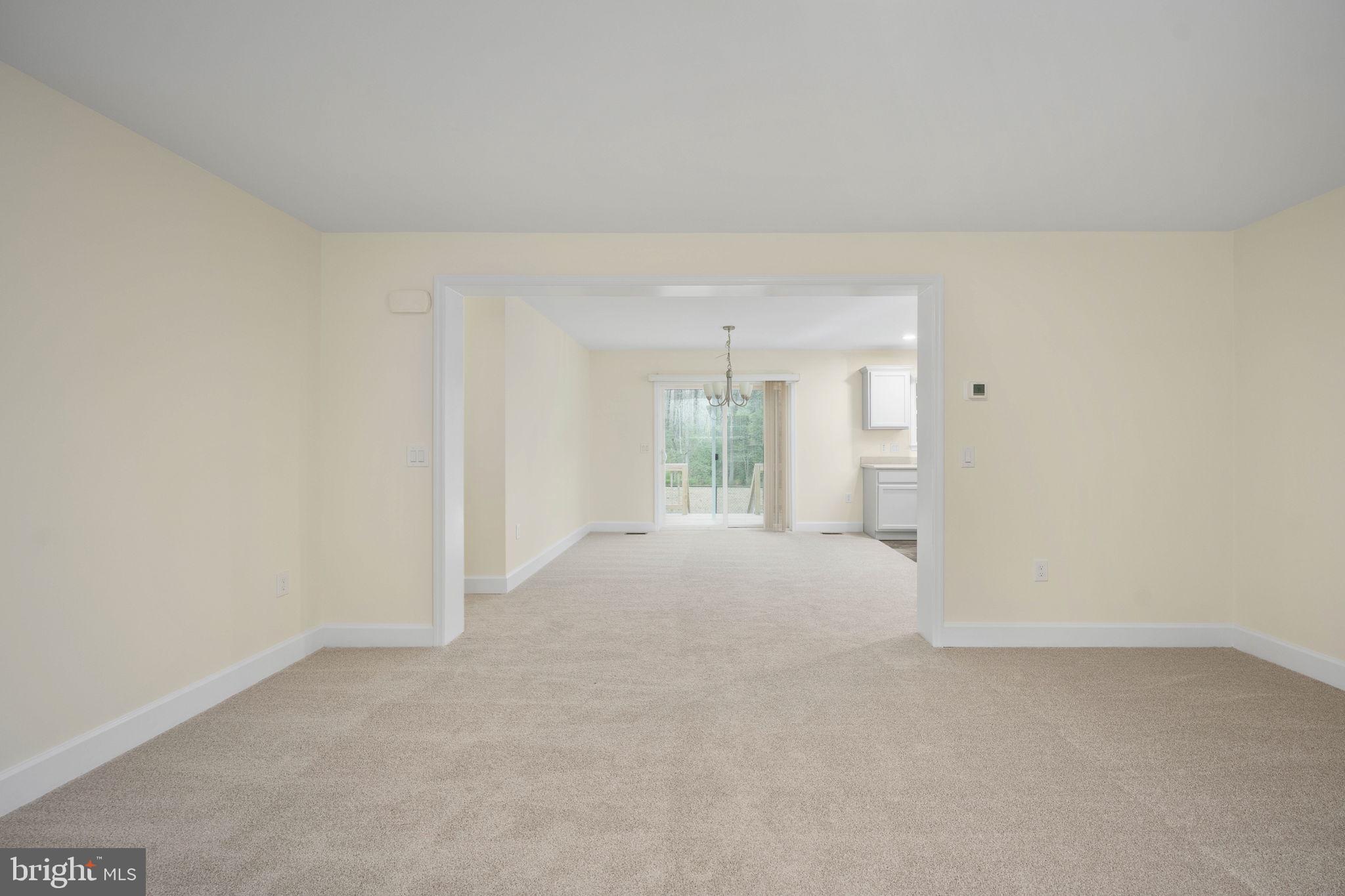 300 River Oaks Road Center Cross, VA 22437 - Photo 9 of 39 Spacious, light-filled living area.