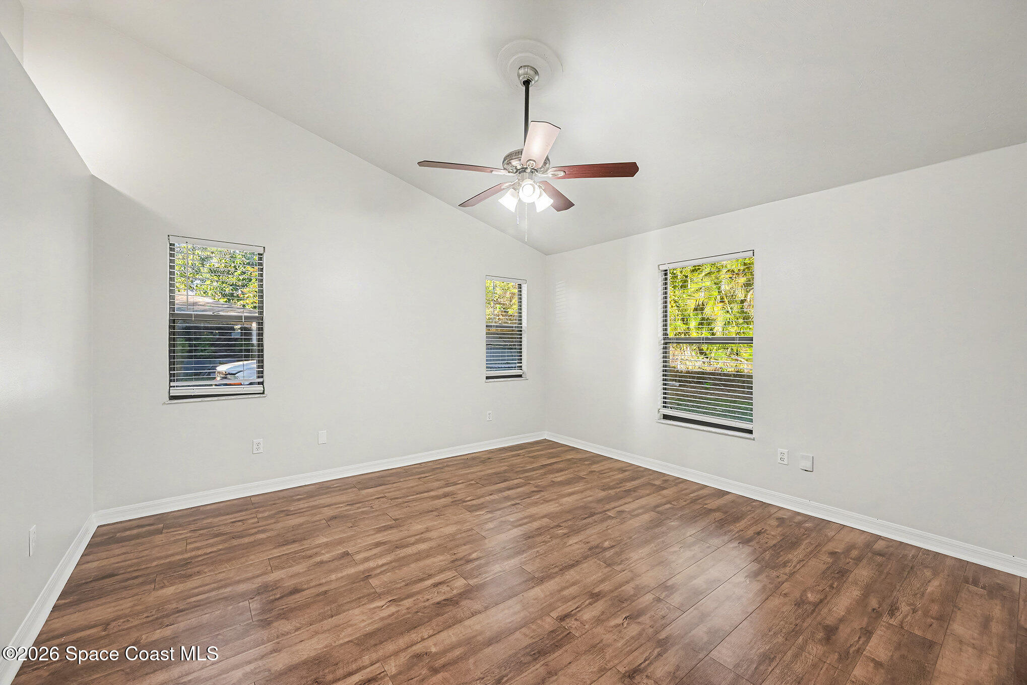 110 Cardinal Drive Sebastian, FL 32958 - Photo 11 of 23 a view of an empty room with a window