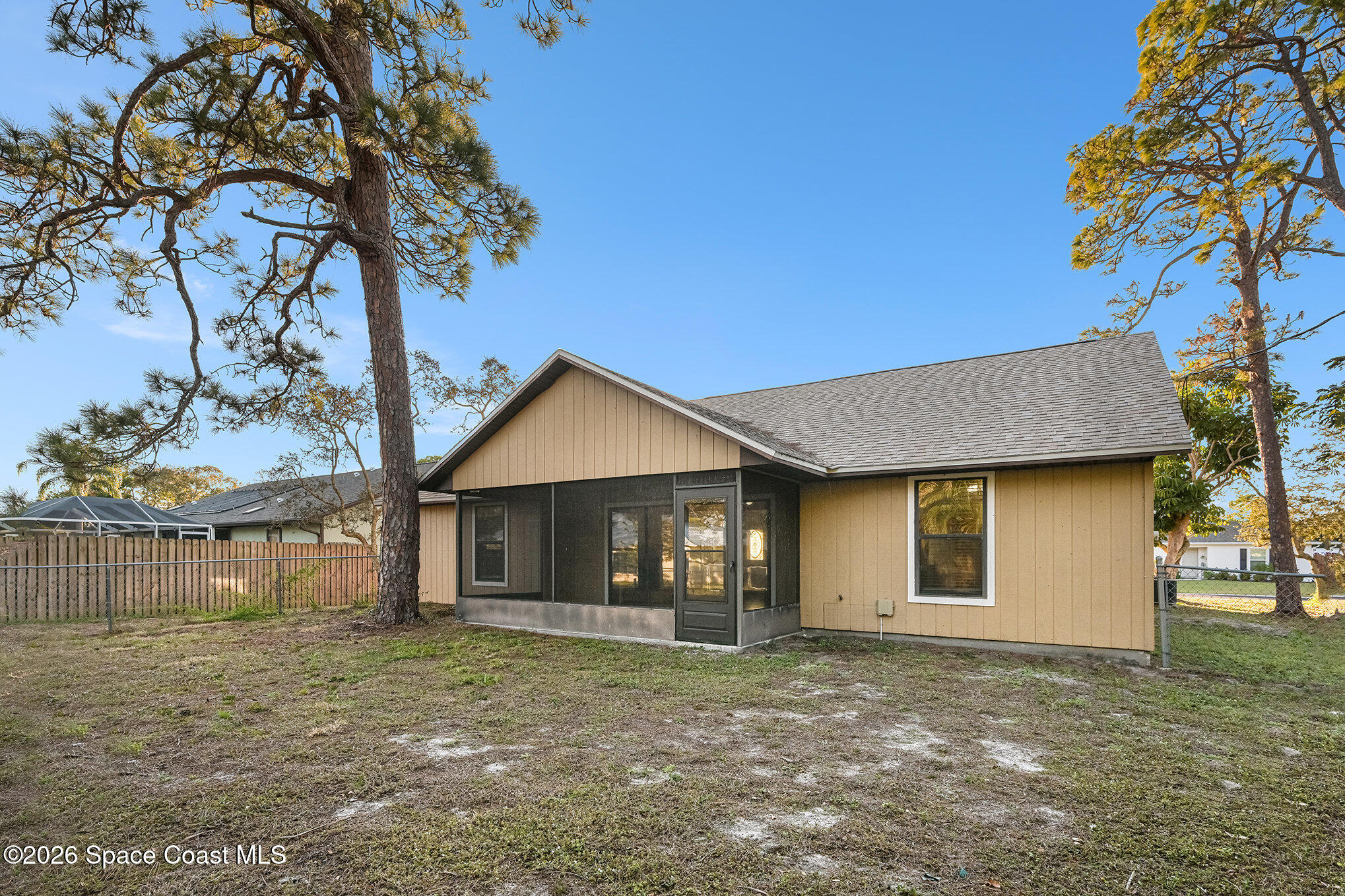 110 Cardinal Drive Sebastian, FL 32958 - Photo 22 of 23 a view of a house with a tree in the background