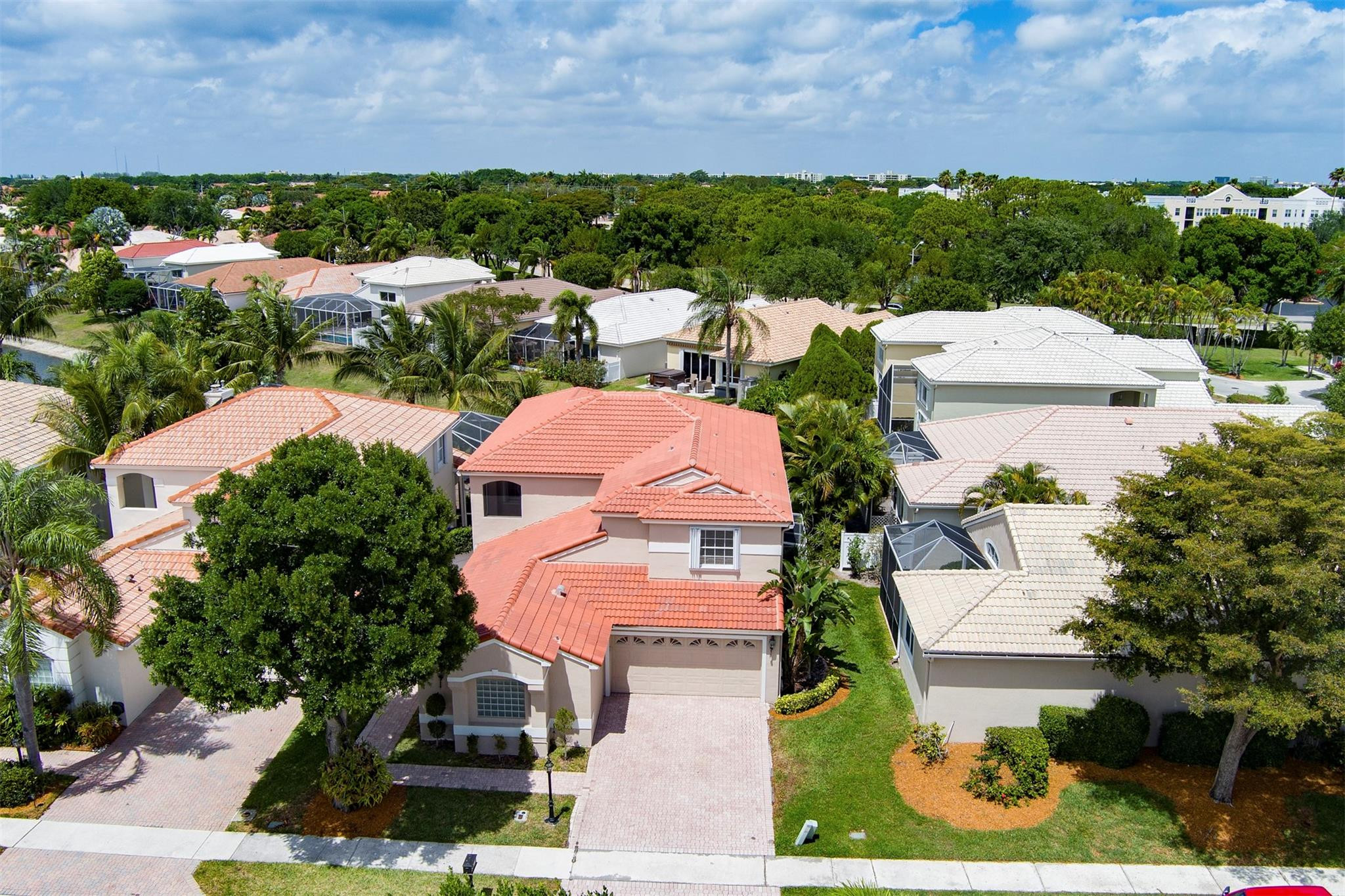 6357 Brava Way Boca Raton, FL 33433 - Photo 12 of 73 an aerial view of multiple houses with yard