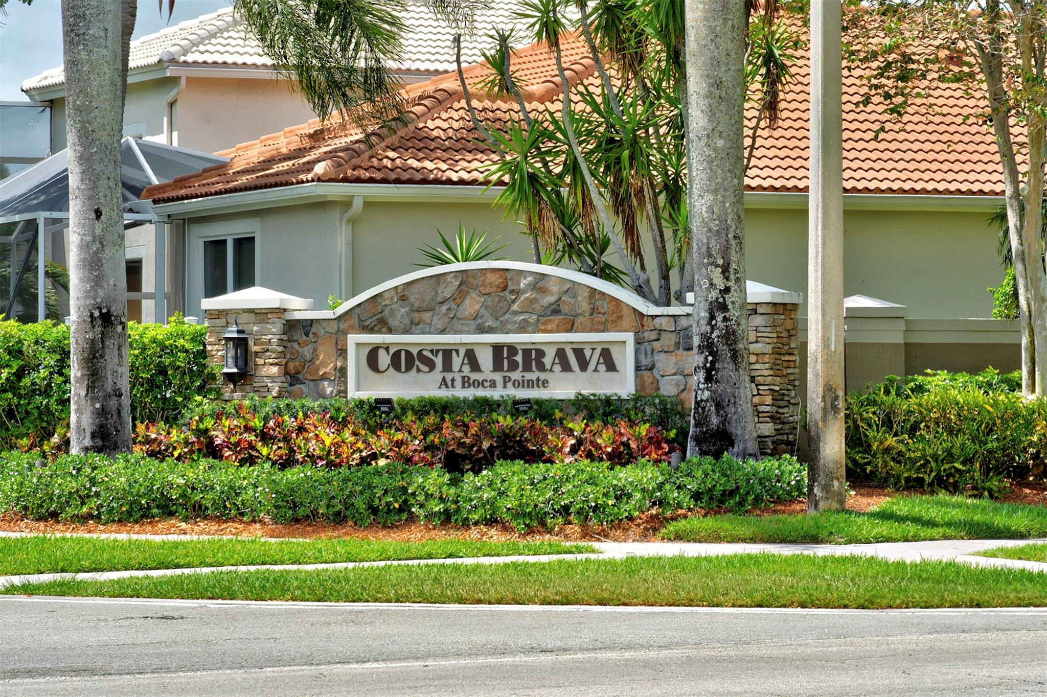 6357 Brava Way Boca Raton, FL 33433 - Photo 14 of 73 a front view of a house with garden