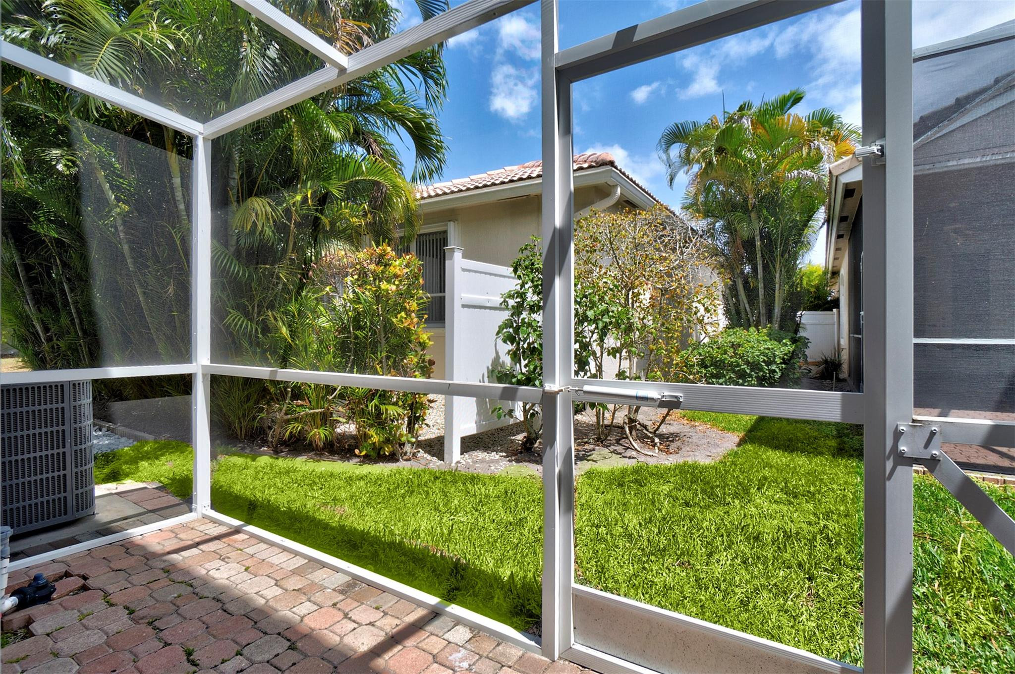 6357 Brava Way Boca Raton, FL 33433 - Photo 24 of 73 a view of a house with backyard from a tub