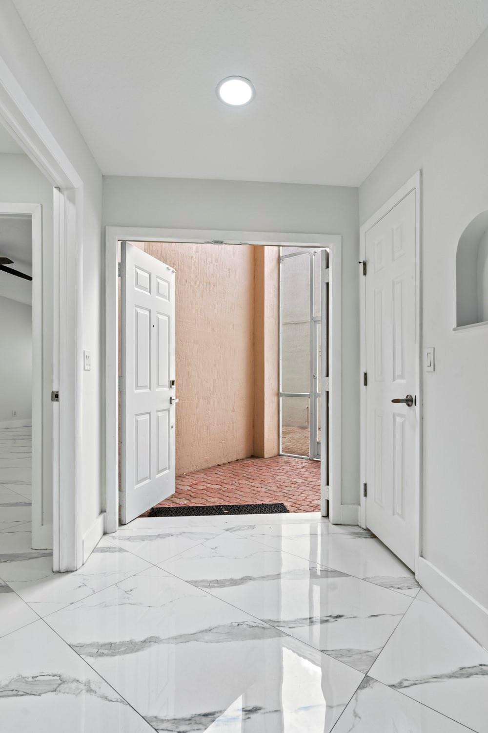 6357 Brava Way Boca Raton, FL 33433 - Photo 36 of 73 a view of room with front door