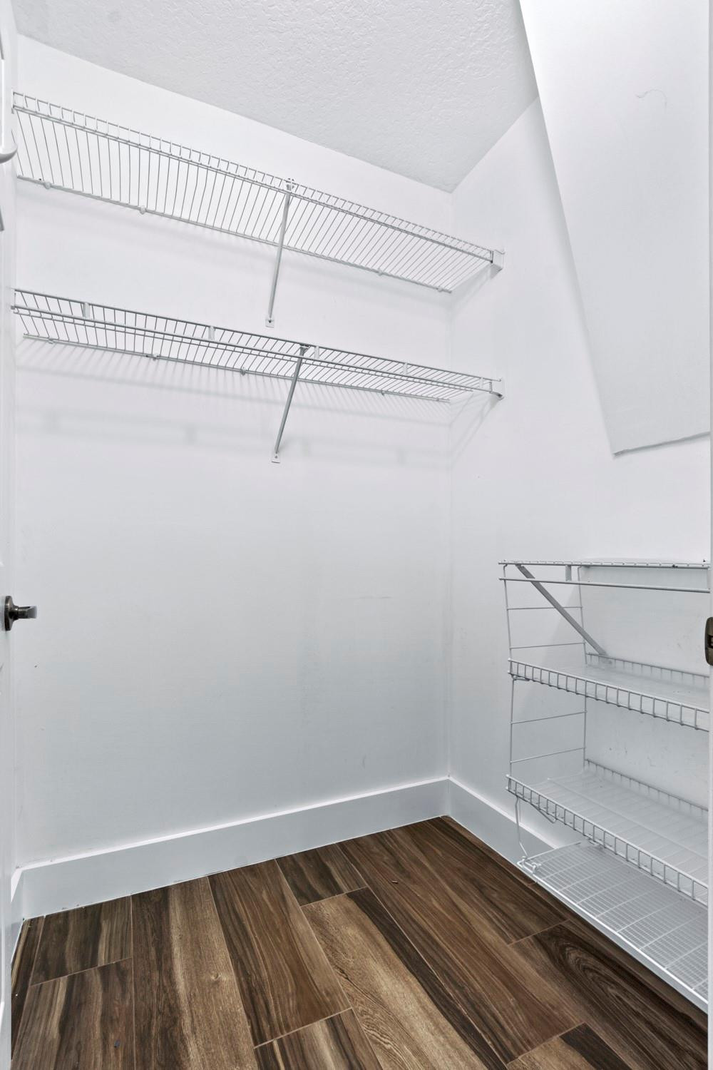 6357 Brava Way Boca Raton, FL 33433 - Photo 61 of 73 a view of a room with racks on the wall