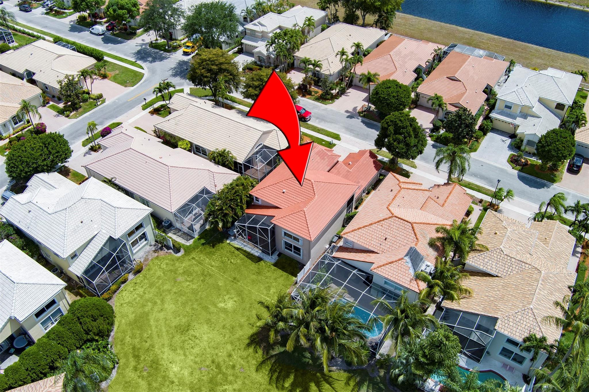 6357 Brava Way Boca Raton, FL 33433 - Photo 8 of 73 an aerial view of a house with swimming pool and outdoor seating
