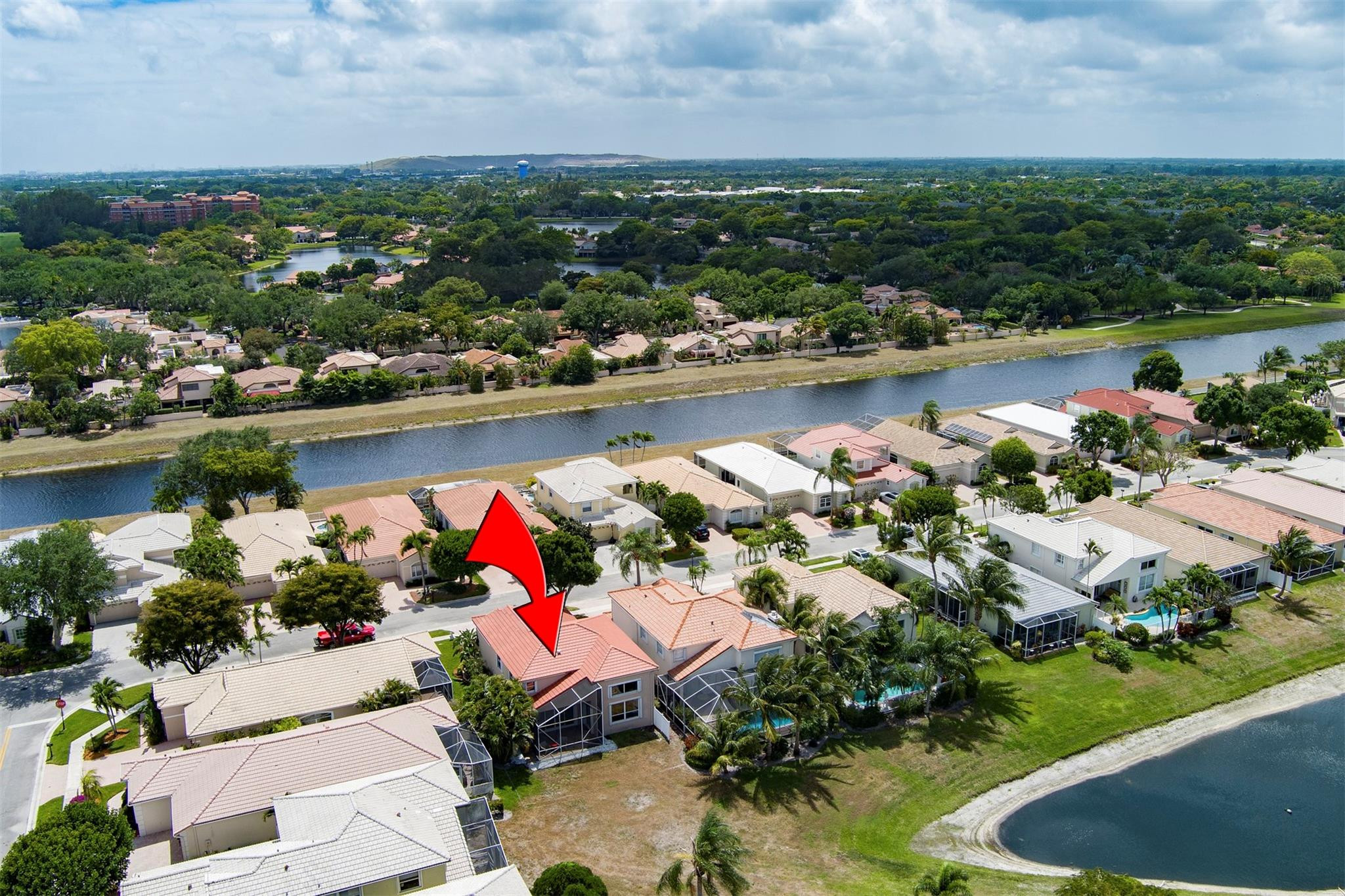 6357 Brava Way Boca Raton, FL 33433 - Photo 9 of 73 an aerial view of lake and residential houses with outdoor space