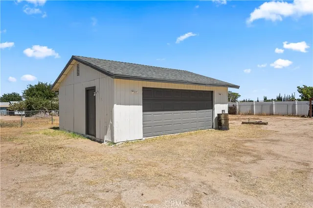 a view of a yard with tree s
