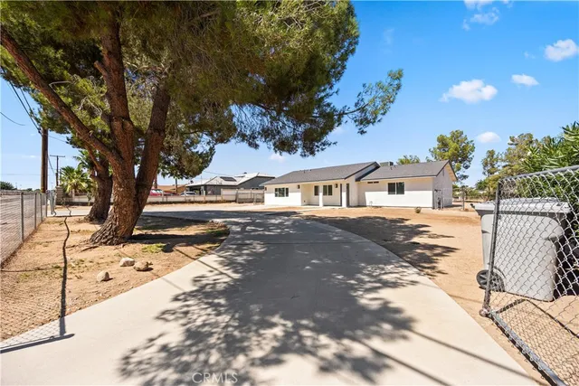 a view of house with a street
