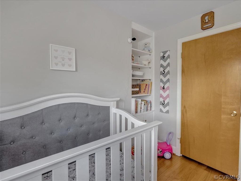 4232 Randolph Road Chesterfield, VA 23236 - Photo 20 of 31 Bedroom with built-ins, hardwood floors, closet