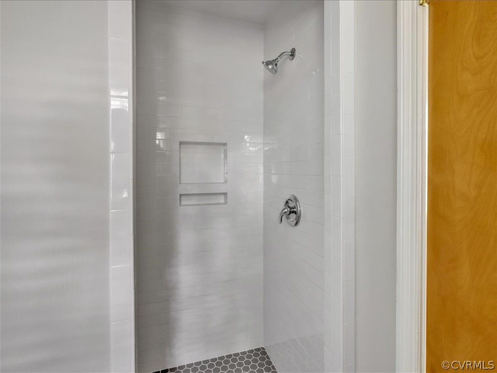 4232 Randolph Road Chesterfield, VA 23236 - Photo 23 of 31 Primary bathroom with tile shower and tile floor