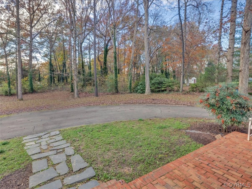4232 Randolph Road Chesterfield, VA 23236 - Photo 26 of 31 paved driveway and sidewalk leading to a rear bric