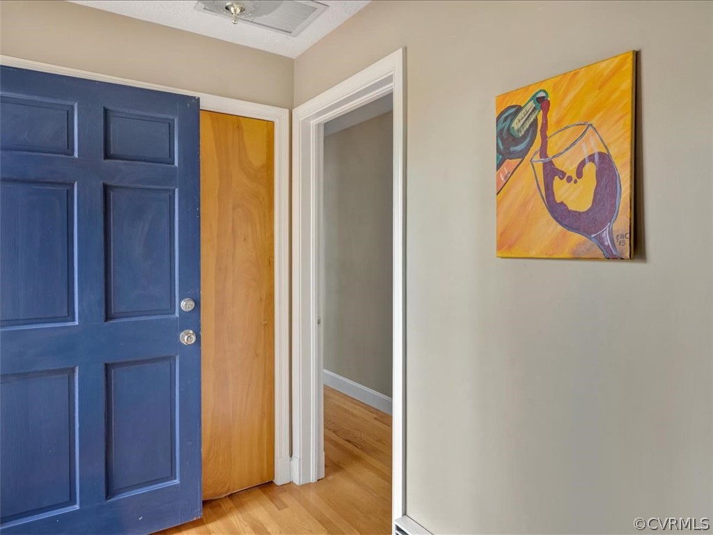 4232 Randolph Road Chesterfield, VA 23236 - Photo 5 of 31 Foyer with hardwood floors, coat closet