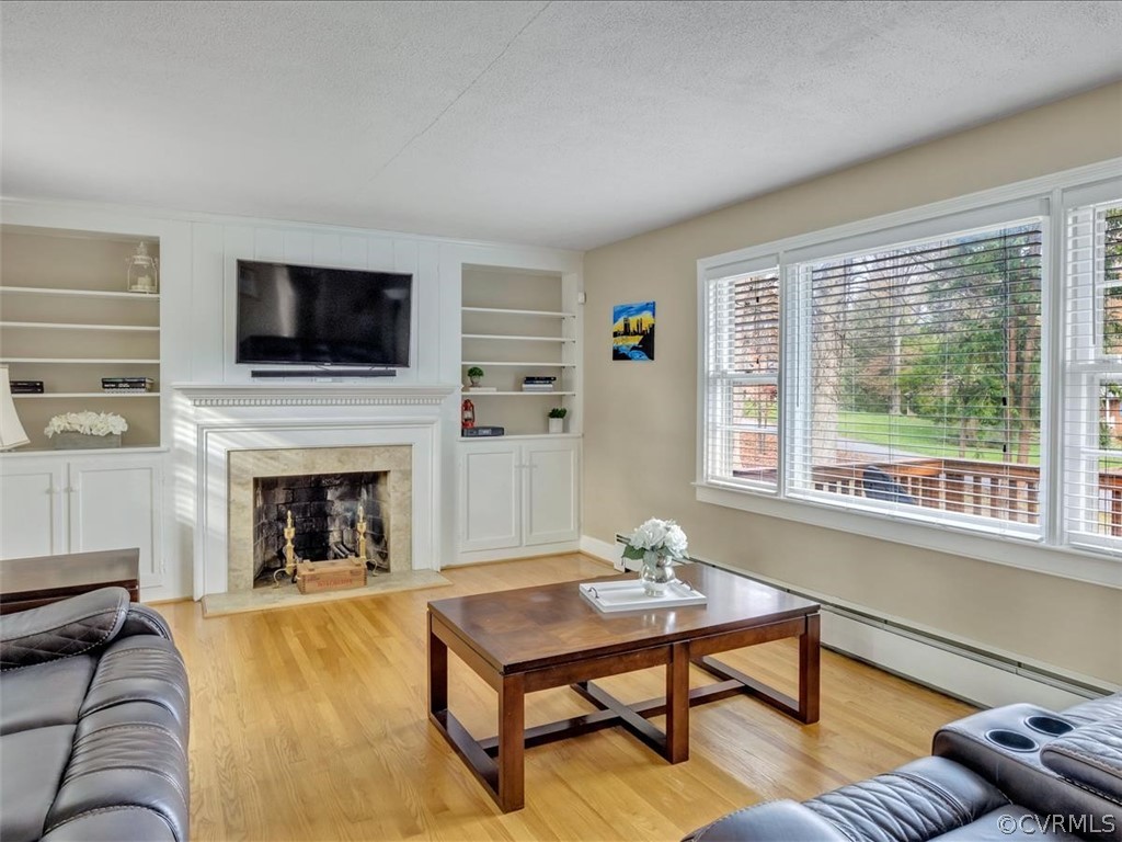4232 Randolph Road Chesterfield, VA 23236 - Photo 6 of 31 Hardwood floors, fireplace with built-ins on eithe