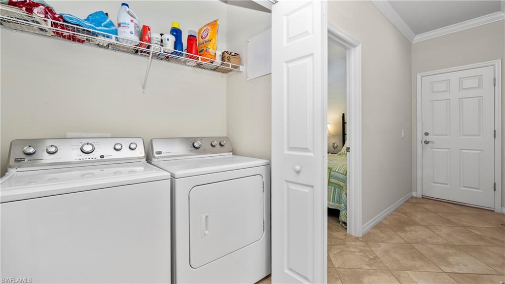 5113 Da Vinci Way Ave Maria, FL 34142 - Photo 21 of 31 a utility room with dryer and washer