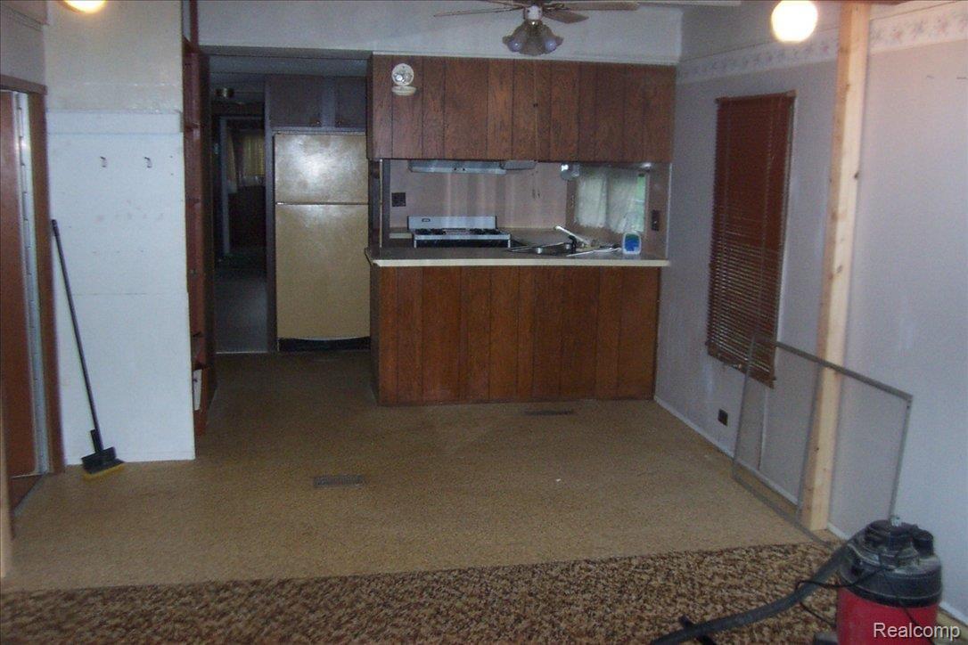 4075 Jewell Road Howell, MI 48843 - Photo 7 of 13 living rm towards kitchen