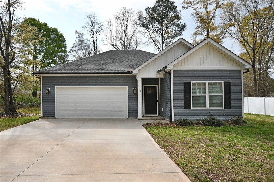 This charming home offers a perfect blend of comfort and style, with a well-maintained exterior.