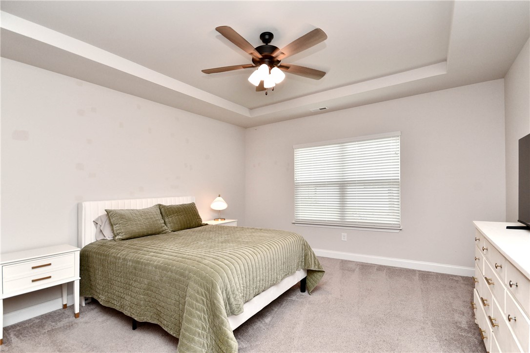 3131 Lullwater Drive Anderson, SC 29624 - Photo 15 of 31 This serene bedroom offers a tranquil retreat with plush carpeting and natural light.