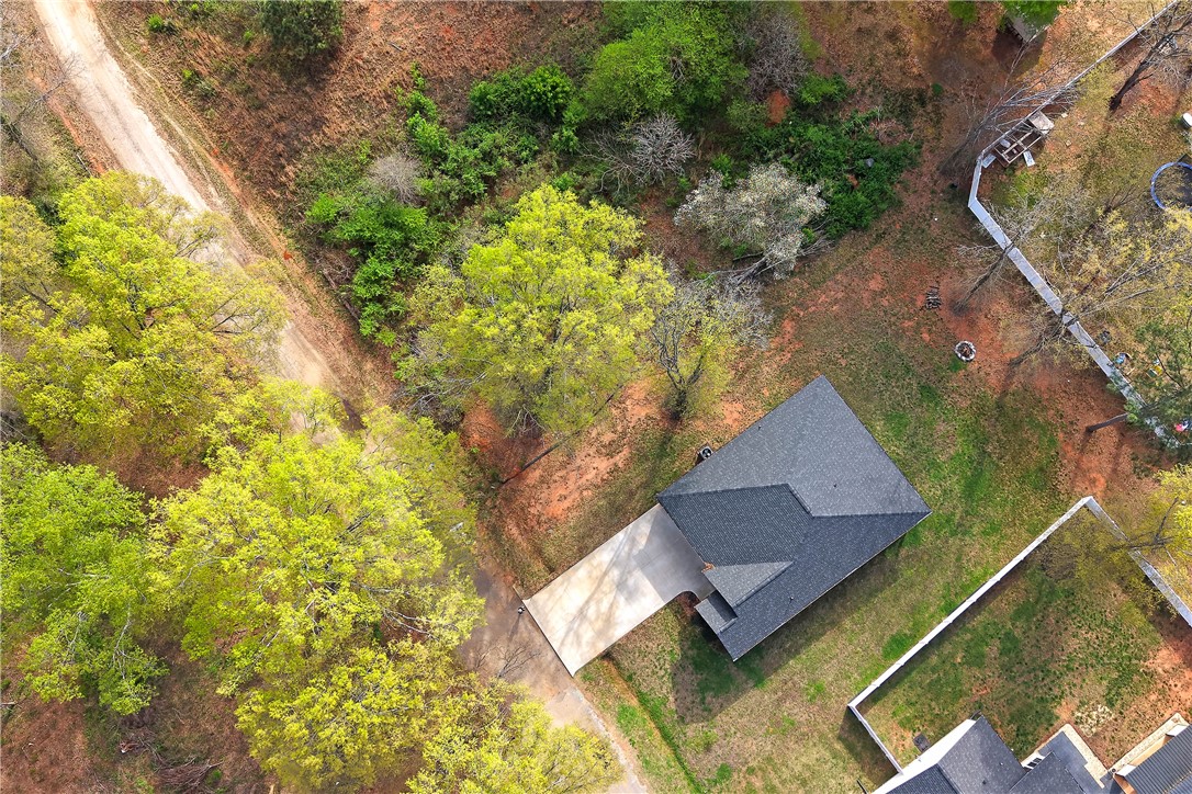 3131 Lullwater Drive Anderson, SC 29624 - Photo 26 of 31 This elevated view captures the residential area surrounded by vibrant green foliage.