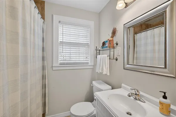 a bathroom with a sink and a toilet