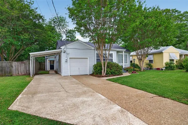 front view of a house and a yard