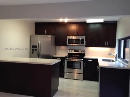 $479,000 | 4724 Southwest 67th Avenue, Unit E10, Miami, FL 33155