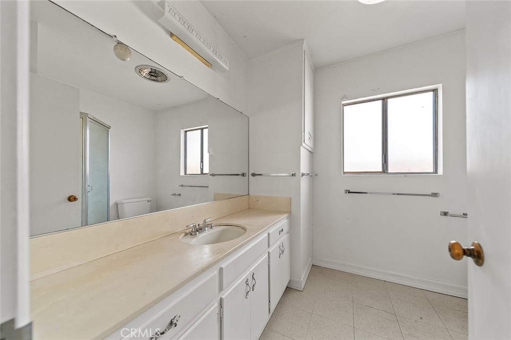 4224 Falcon Avenue Long Beach, CA 90807 - Photo 11 of 16 a bathroom with a sink and a mirror