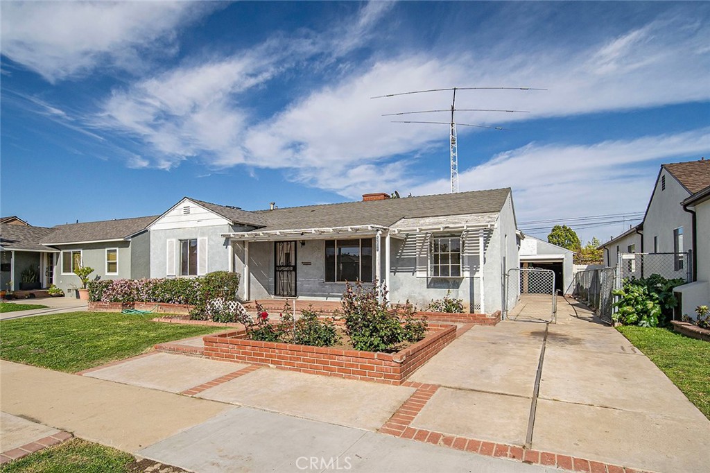 4224 Falcon Avenue Long Beach, CA 90807 - Photo 16 of 16 a front view of a house with a yard