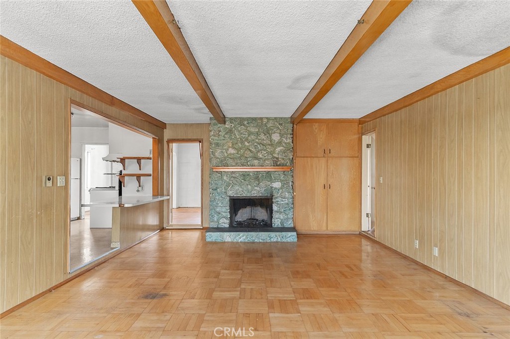 4224 Falcon Avenue Long Beach, CA 90807 - Photo 8 of 16 a view of an empty room with a fireplace