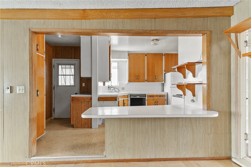 4224 Falcon Avenue Long Beach, CA 90807 - Photo 10 of 16 a view of living room with a large window and potted plant