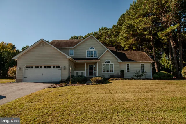 a front of a house with a yard