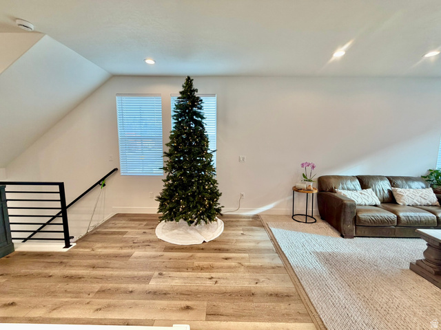 545 East 7215 South Midvale, UT 84047 - Photo 3 of 27 Living area with light wood-style flooring, recessed lighting, and lofted ceiling